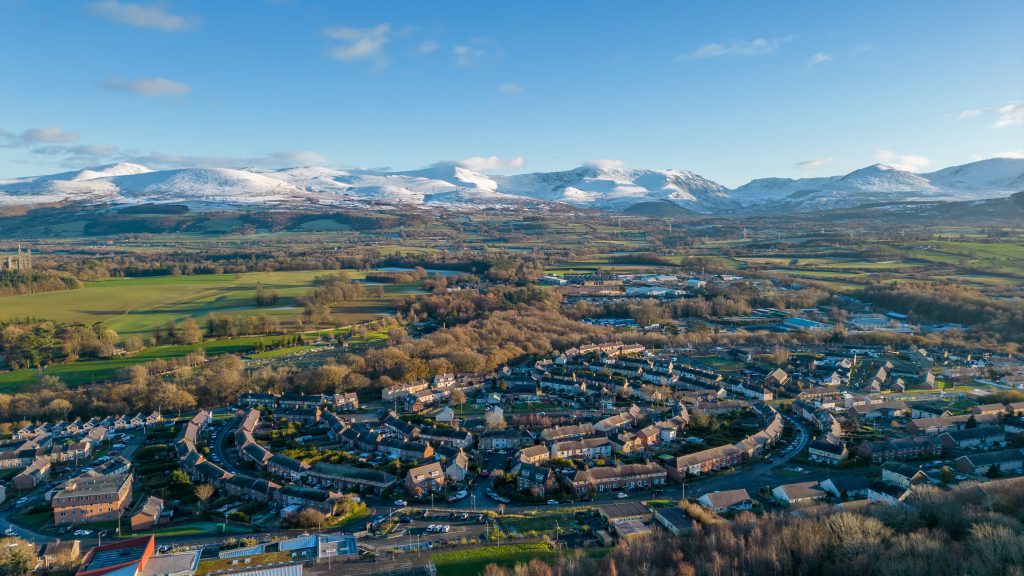 Photo from the sky of Maesgeirchen with Snowdonia in the background.