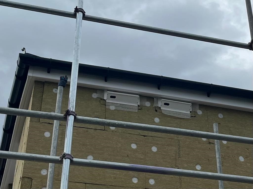 Swift boxes being installed on a property